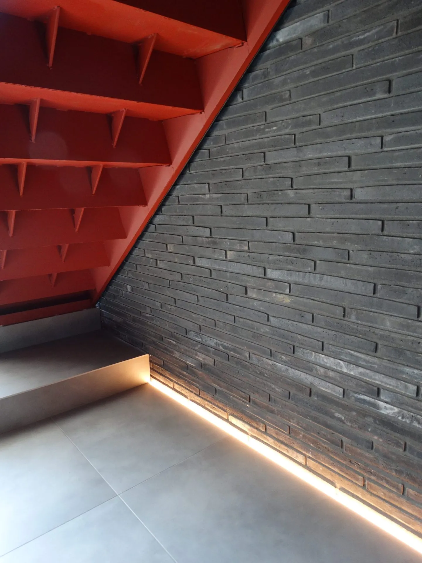 Shards interior, exposed brick thermal-mass wall
