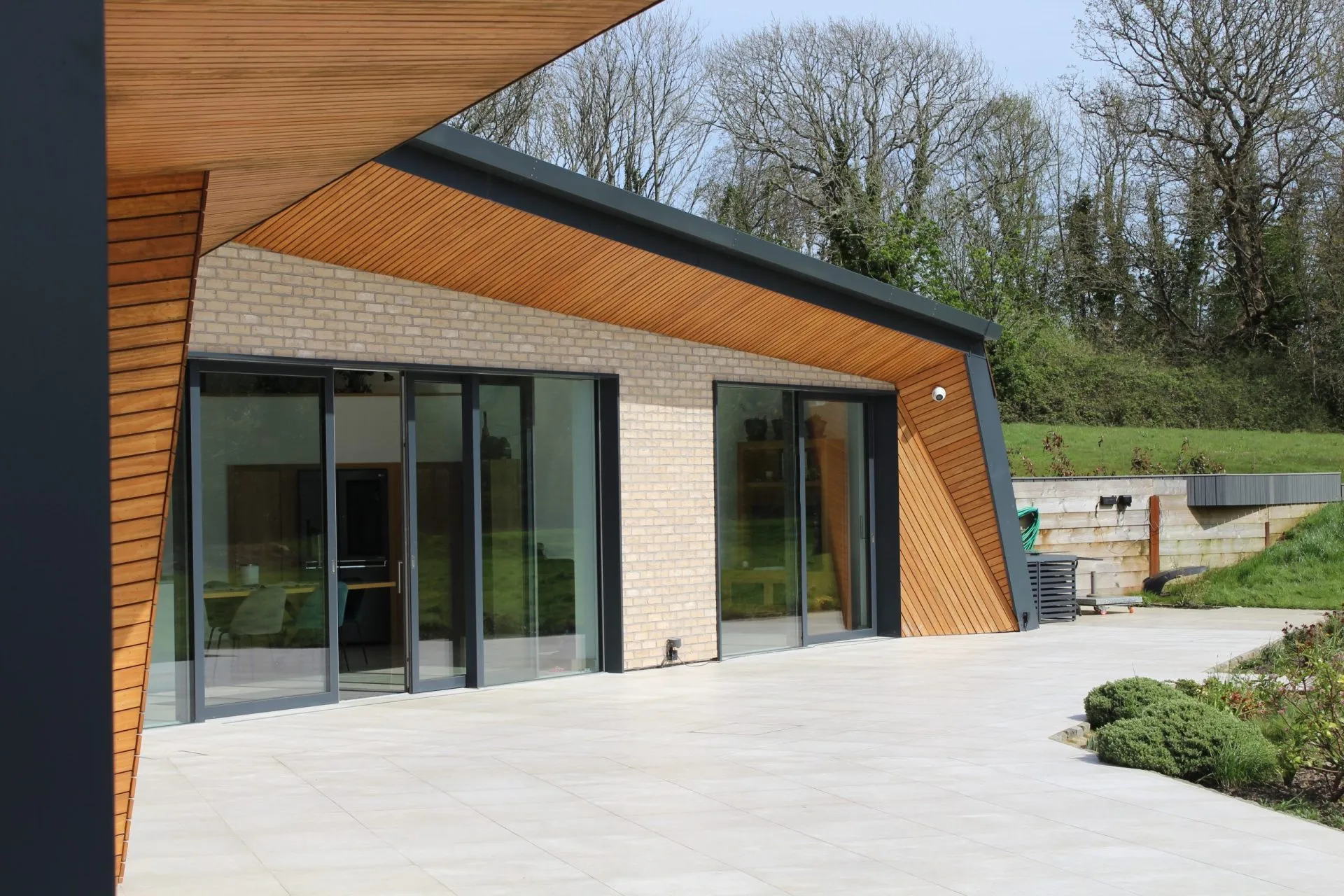 Weald House from the south, horizontal glazing fronting the Sussex landscape